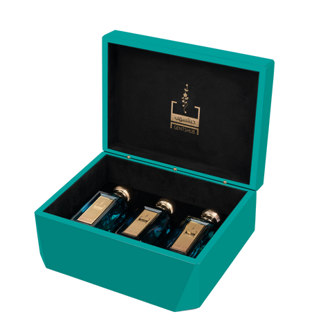 Luxury Teal Perfume Gift Box Open with Gold Accent Perfume Bottles