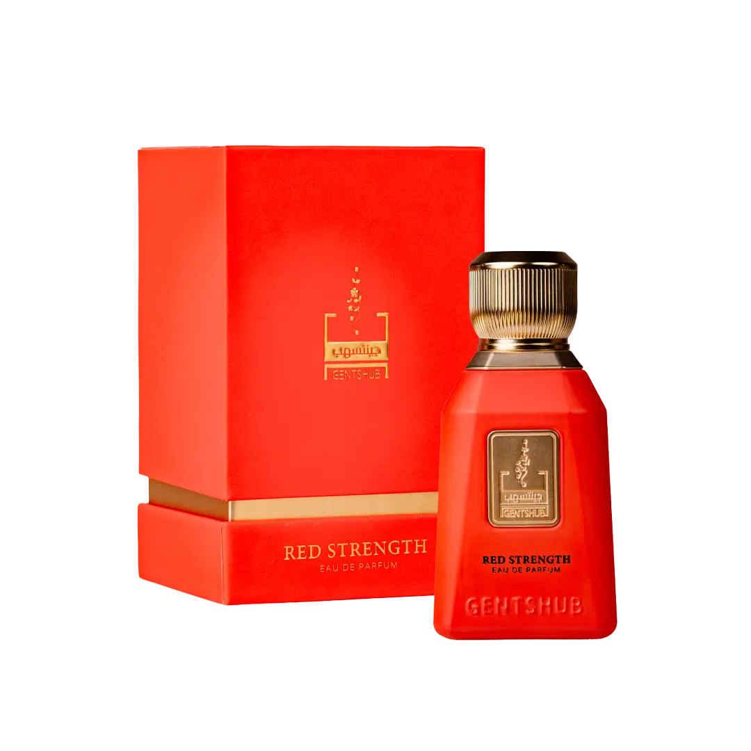 A red rectangular perfume bottle with a gold cap stands in front of a matching red box with gold lettering on a white background.